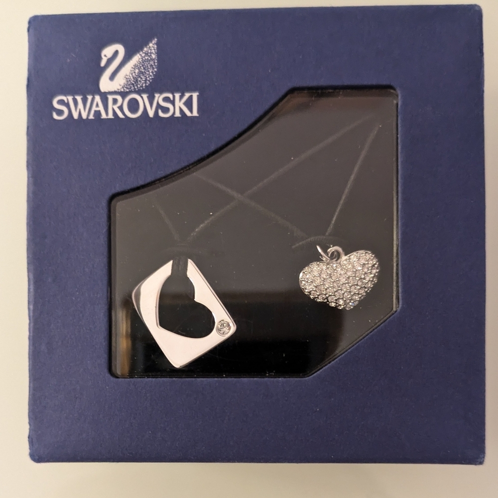 New in box two Swarovski Heart Pendant